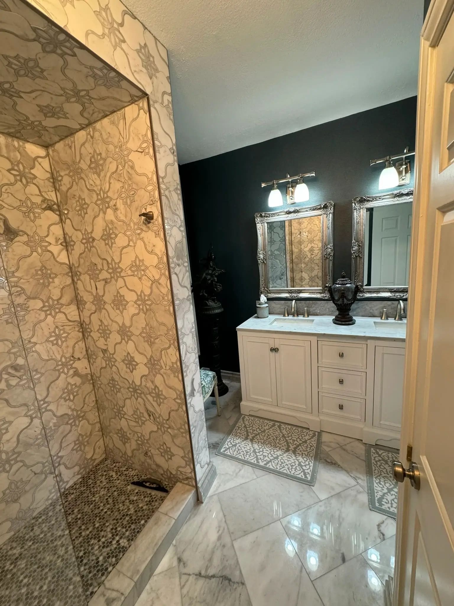 Bathroom remodel: cream vanity patterned shower