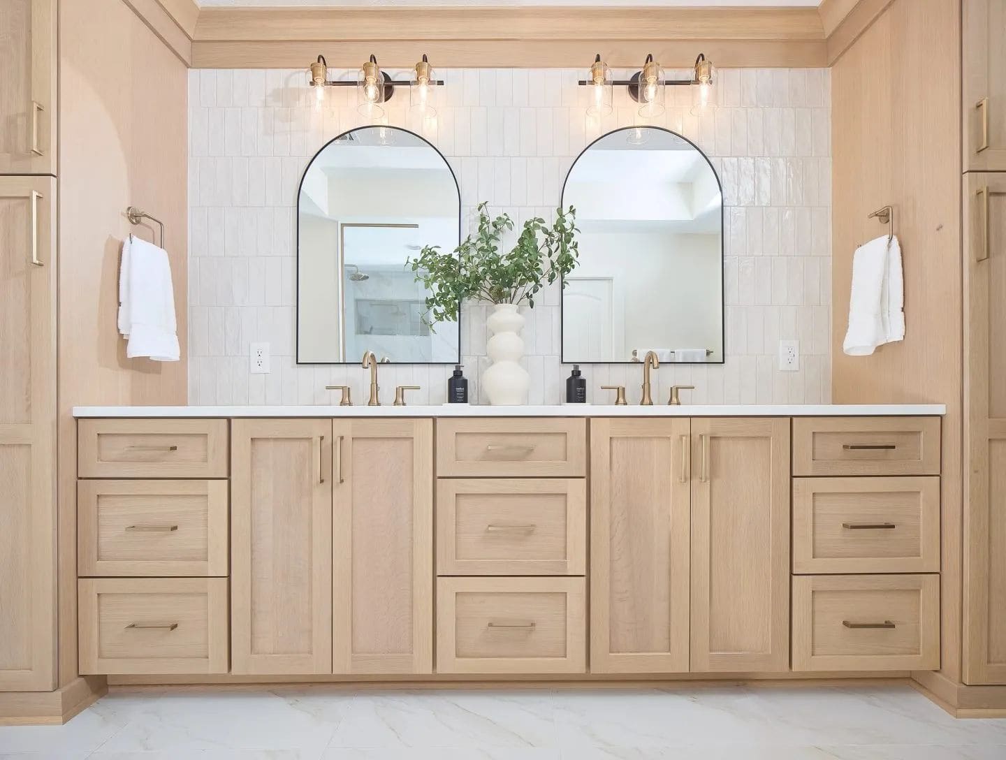 Bathroom remodel: double vanity arched mirrors