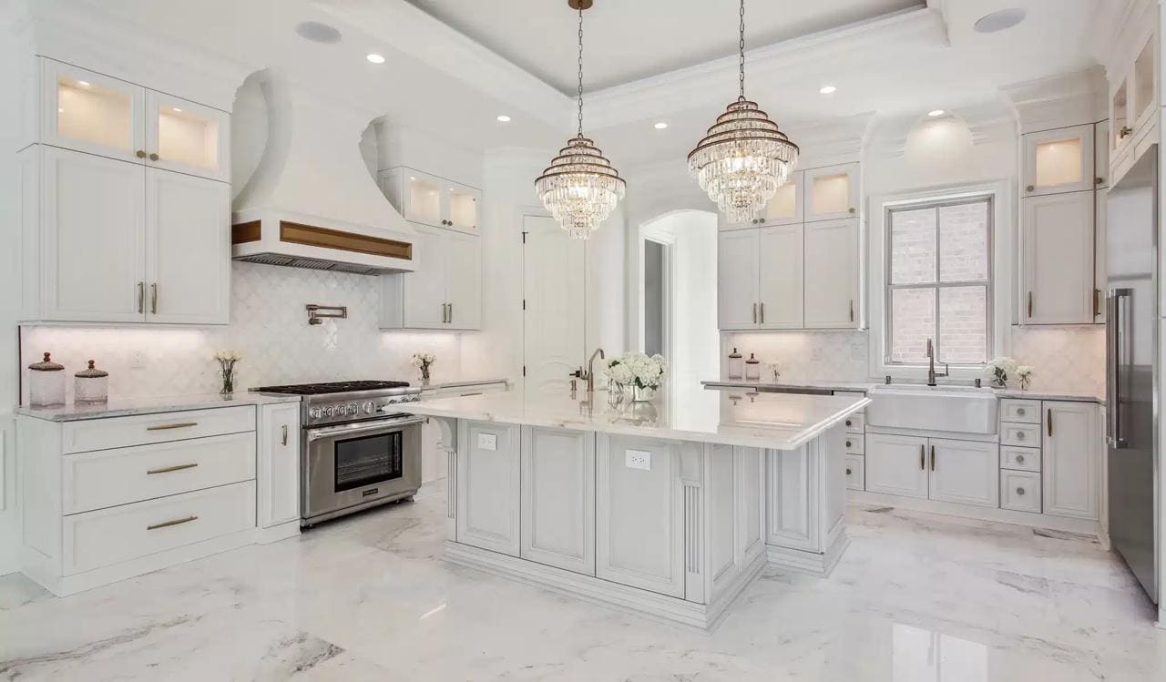 Kitchen remodel: crystal pendants marble island