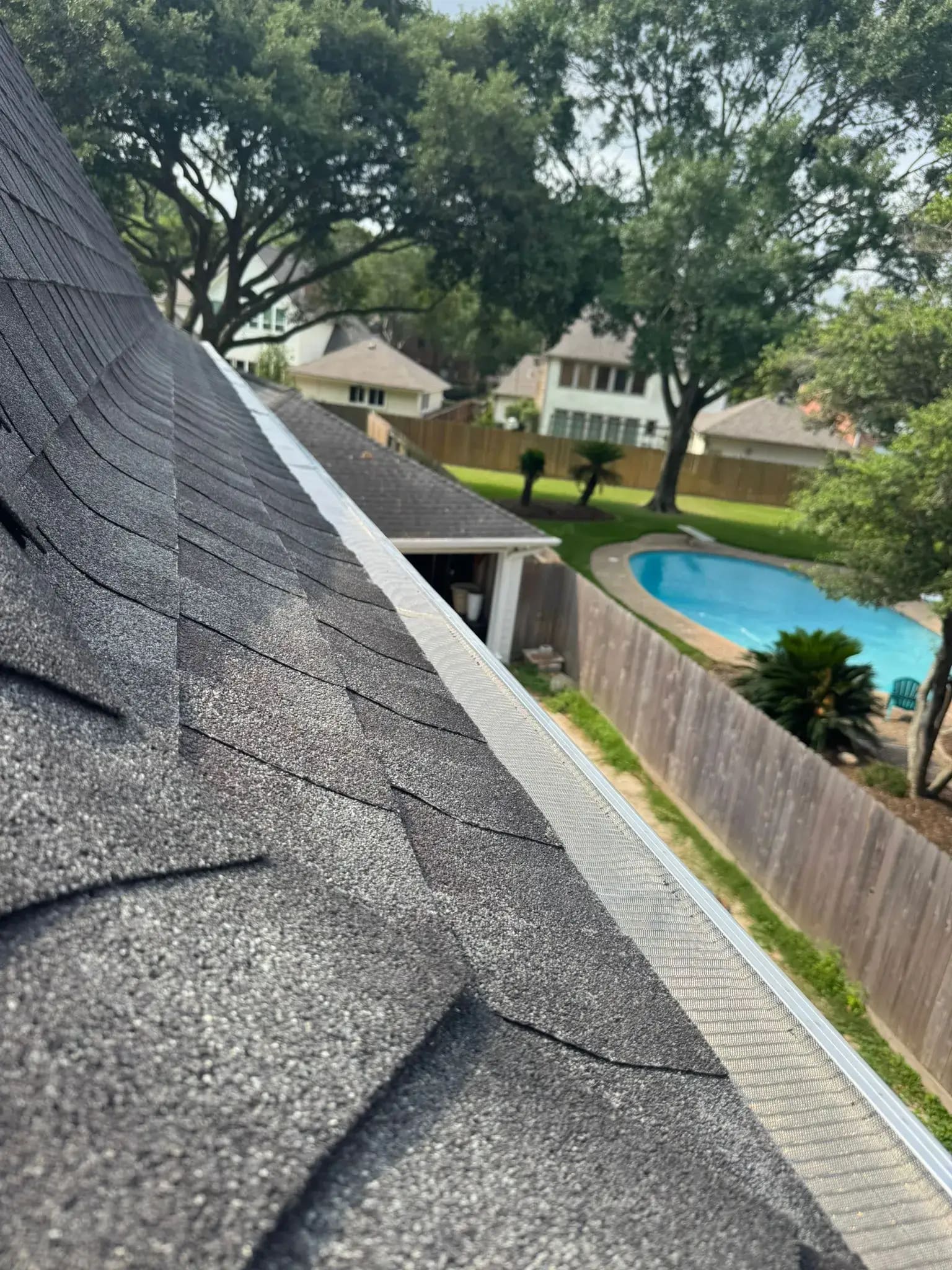Roofing: roof over backyard pool