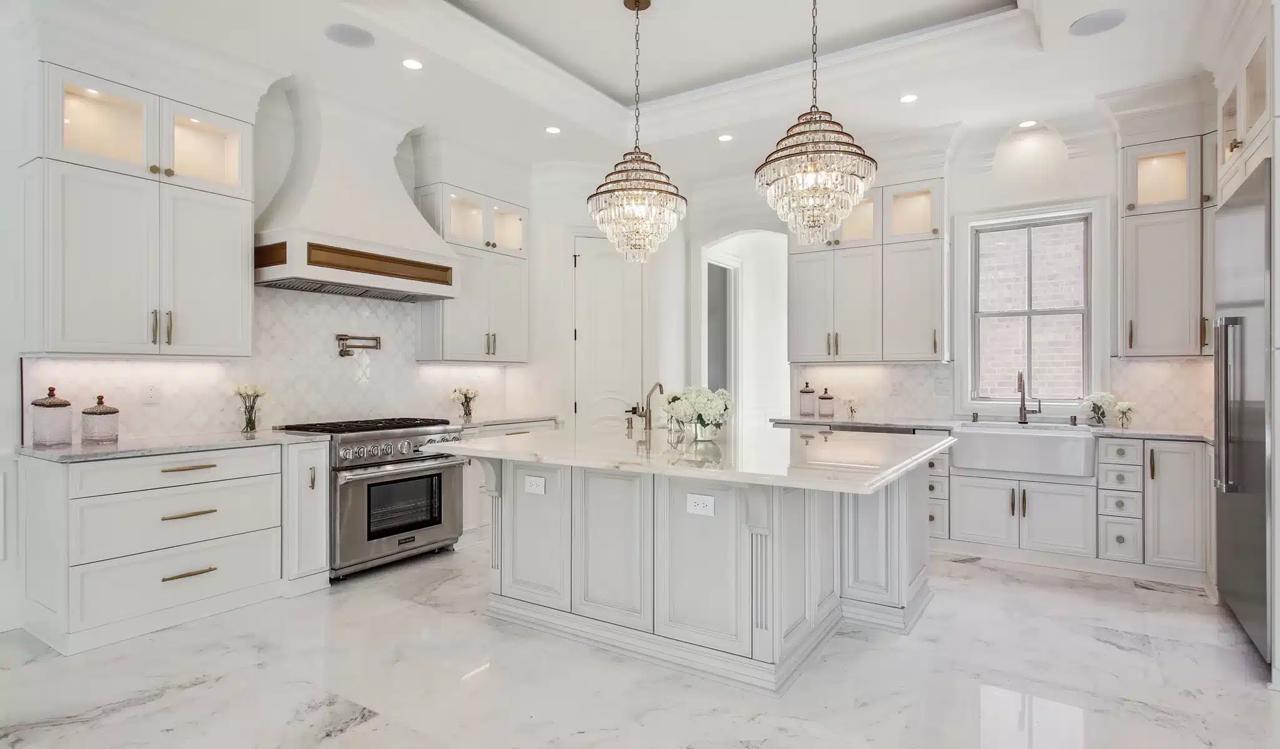 Kitchen remodel: crystal pendants marble island